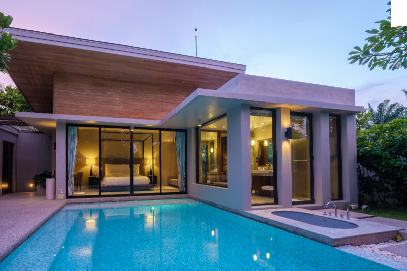 Modern house with a swimming pool, modern pool villa at the beach